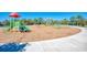 Colorful playground with slides, swings, and climbing equipment at 1387 Still River Dr, Venice, FL 34293