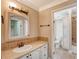 Bathroom with vanity, toilet, and a shower/tub combo at 1732 Hillview St, Sarasota, FL 34239