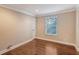 Bright bedroom with hardwood floors and a window at 1732 Hillview St, Sarasota, FL 34239