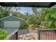 Attached garage with paver driveway and lush landscaping at 1732 Hillview St, Sarasota, FL 34239