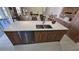 Modern kitchen with an island with sleek appliances and counter seating, perfect for casual dining and entertaining at 1859 Lamont St, North Port, FL 34288