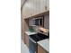Modern kitchen features stainless steel appliances, sleek countertops, and ample cabinet space for storage at 1859 Lamont St, North Port, FL 34288