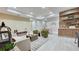Spacious open-concept living space with modern decor, recessed lighting, and stylish furnishings at 1859 Lamont St, North Port, FL 34288