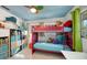 bedroom with bunk bed, shelving, and playful decor at 2674 Jefferson Cir, Sarasota, FL 34239