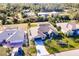 Bird's-eye view of a single-story house in a residential neighborhood at 301 Gold Tree, Punta Gorda, FL 33955