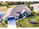 Single story home with a large yard, pool and attached garage at 301 Gold Tree, Punta Gorda, FL 33955