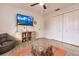 Bedroom with TV, storage, and a comfortable seating area at 301 Gold Tree, Punta Gorda, FL 33955
