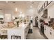 Modern kitchen with large island, white cabinets, and ample counter space at 301 Gold Tree, Punta Gorda, FL 33955