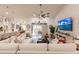 Bright and airy living area with comfortable seating and large TV at 301 Gold Tree, Punta Gorda, FL 33955