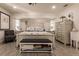 Relaxing main bedroom with king-size bed, dresser, and tranquil atmosphere at 301 Gold Tree, Punta Gorda, FL 33955