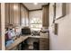 Home office with built-in cabinetry and window view at 301 Gold Tree, Punta Gorda, FL 33955