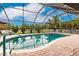 Escape to your own private oasis with this screened pool at 301 Gold Tree, Punta Gorda, FL 33955