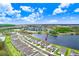 Two story house next to a lake at 33443 Landsman Loop, Wesley Chapel, FL 33543