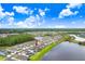 Two story house next to a lake at 33443 Landsman Loop, Wesley Chapel, FL 33543