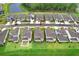 Aerial view of house and surrounding homes at 33443 Landsman Loop, Wesley Chapel, FL 33543