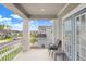 Relaxing balcony with seating, overlooking the community at 33443 Landsman Loop, Wesley Chapel, FL 33543