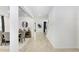 Bright entryway with view of dining room and staircase at 33443 Landsman Loop, Wesley Chapel, FL 33543