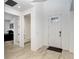 Bright entryway with tile flooring and built-in bench at 33443 Landsman Loop, Wesley Chapel, FL 33543