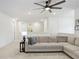 Open loft area featuring a comfortable sectional sofa at 33443 Landsman Loop, Wesley Chapel, FL 33543