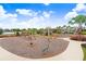playground with swings and play structures at 33443 Landsman Loop, Wesley Chapel, FL 33543