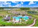 Aerial view of community pool and amenities at 33443 Landsman Loop, Wesley Chapel, FL 33543