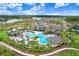 Resort-style pool with lounge chairs and cabanas at 33443 Landsman Loop, Wesley Chapel, FL 33543