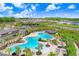 Community pool with expansive deck area at 33443 Landsman Loop, Wesley Chapel, FL 33543