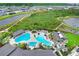 Aerial view of community pool and surrounding area at 33443 Landsman Loop, Wesley Chapel, FL 33543