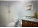 Clean bathroom with shower, toilet and granite vanity at 4202 E Richmere St, Tampa, FL 33617