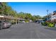 Covered parking area with ample spaces for residents at 4264 Central Sarasota Pkwy # 111, Sarasota, FL 34238