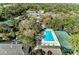 Aerial view of community pool and tennis courts at 5496 Hampstead Heath # 10, Sarasota, FL 34235