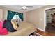 Cozy bedroom with double bed, wood floors, and ceiling fan at 6261 Keating Ave, North Port, FL 34291