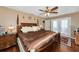 Large bedroom with king-size bed and wood floors at 6261 Keating Ave, North Port, FL 34291