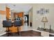 Kitchen with breakfast bar and view into the living room at 6261 Keating Ave, North Port, FL 34291