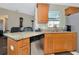 Kitchen with granite countertop and wood cabinets at 6261 Keating Ave, North Port, FL 34291