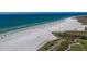 Aerial view of a crowded beach on a sunny day at 633 Calle De Peru, Sarasota, FL 34242