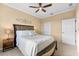 Light and airy bedroom with plush bed and wooden nightstands at 6614 38Th E St, Sarasota, FL 34243