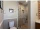 Updated bathroom with glass shower and neutral tile at 6727 Anchor Way, Sarasota, FL 34231