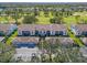 Complex of attached villas with lush green surroundings at 6908 Drewrys Blf # 711, Bradenton, FL 34203