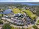 Aerial view of country club, golf course, and community at 6908 Drewrys Blf # 711, Bradenton, FL 34203