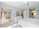 Spacious bedroom with access to lanai and dresser at 6908 Drewrys Blf # 711, Bradenton, FL 34203
