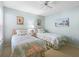Guest bedroom with twin beds and window at 6908 Drewrys Blf # 711, Bradenton, FL 34203