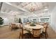 Elegant clubhouse with tables and chairs for dining and events at 6908 Drewrys Blf # 711, Bradenton, FL 34203