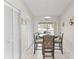 Condo dining area with round table and chairs at 6908 Drewrys Blf # 711, Bradenton, FL 34203