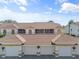 Complex exterior view, showing building and garages at 6908 Drewrys Blf # 711, Bradenton, FL 34203