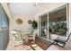 Enjoy morning coffee on this screened lanai with outdoor furniture at 6908 Drewrys Blf # 711, Bradenton, FL 34203