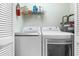 Convenient laundry room with washer and dryer at 6908 Drewrys Blf # 711, Bradenton, FL 34203