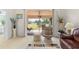 Living area with access to balcony and view of golf course at 6908 Drewrys Blf # 711, Bradenton, FL 34203