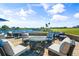 Community patio area with seating and water views at 6908 Drewrys Blf # 711, Bradenton, FL 34203