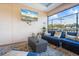 Outdoor patio with seating area and a TV at 6908 Drewrys Blf # 711, Bradenton, FL 34203